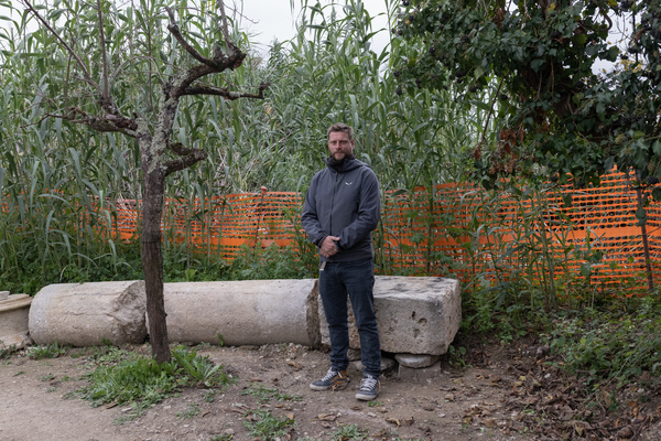 Ludovico Salerno, vice president of the San Casciano dei Bagni Archaeological Association, at the archaeological site on Nov. 12. "Sick people came to the sanctuary in the hopes of being cured and would offer gifts to the gods," he says. "It was a place of suffering, and it was a place of hope."