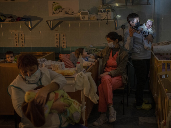 Hospital staff take care of orphaned children at the children's regional hospital maternity ward in Kherson, southern Ukraine, Tuesday, Nov. 22, 2022. Throughout the war in Ukraine, Russian authorities have been accused of deporting Ukrainian children to Russia or Russian-held territories to raise them as their own.