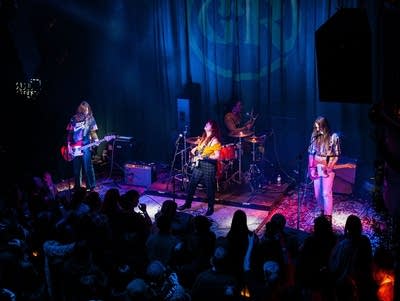 View from above of band and the backs of crowd members