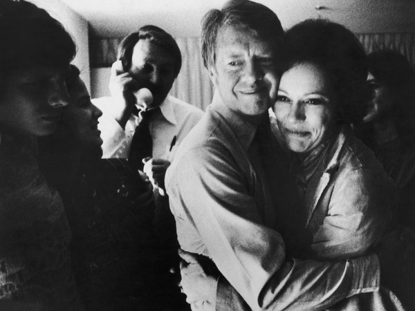 Democratic presidential candidate Jimmy Carter embraces Rosalynn after receiving the final news of his victory in the 1976 general election.
