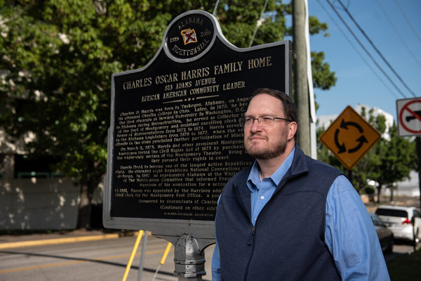 Scotty Kirkland stands in front of a new historical marker in Montgomery, where he is chairman of the Alabama Historical Association's Historical Marker Committee. The committee is trying to move on from Confederate stories through its new History Revealed program.