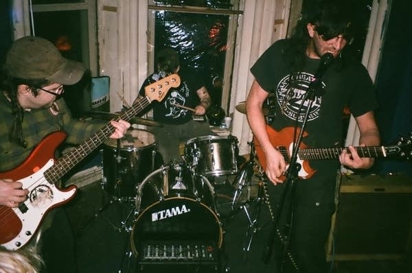 A band plays in a house