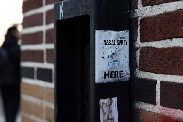 A sign says “Narcan nasal spray here” in the Kensington neighborhood of Philadelphia, Pennsylvania on Feb. 26.