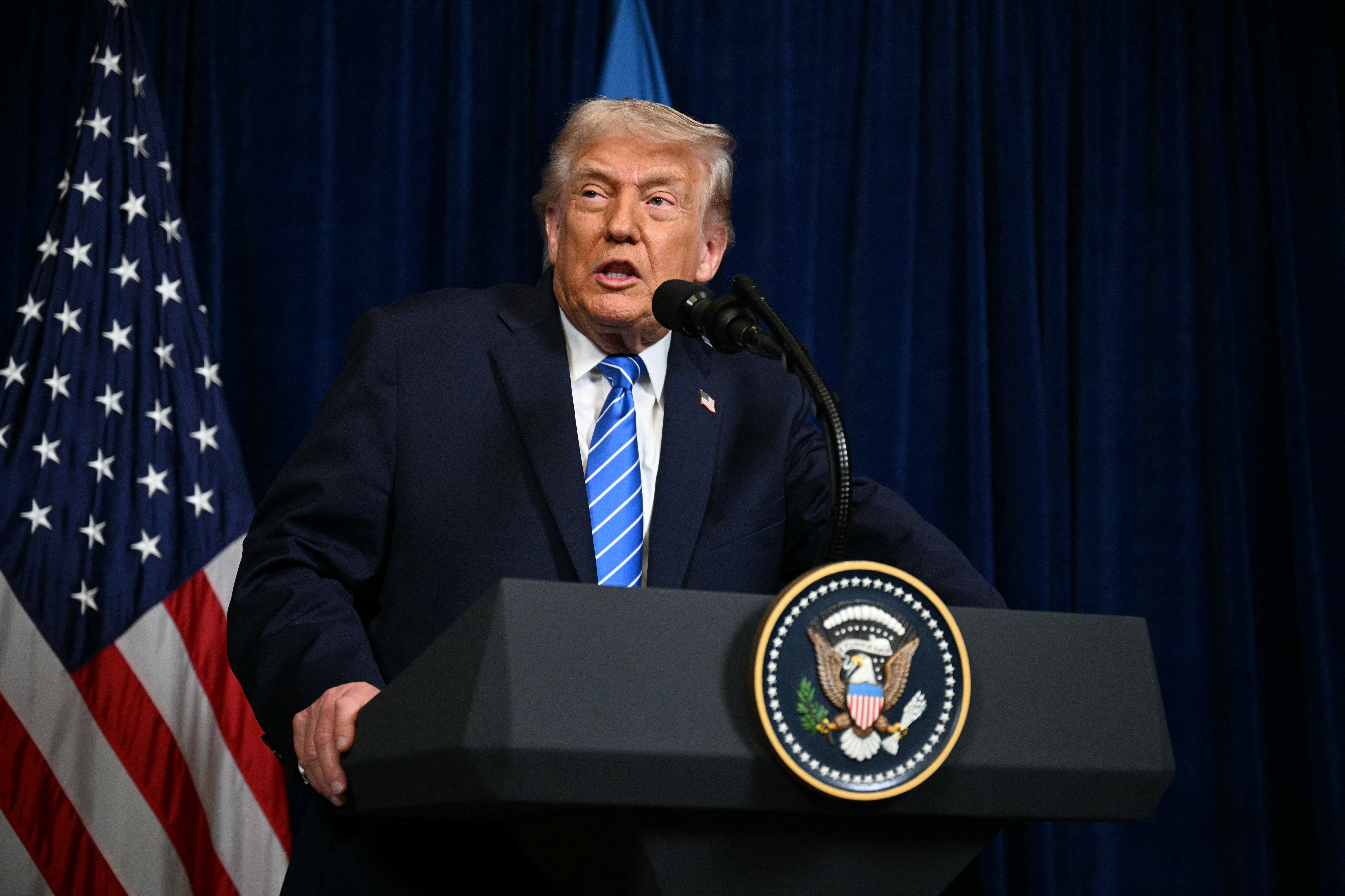 Trump at a podium