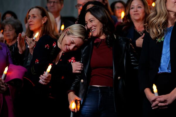 Jeffrey Epstein abuse survivor Danielle Bensky and National Director of World Without Exploitation Lauren Hersh embrace after receiving word that the U.S. Senate unanimously approved passage of the House's Epstein Files Transparency Act on Capitol Hill on Nov. 18, 2025, in Washington, D.C.