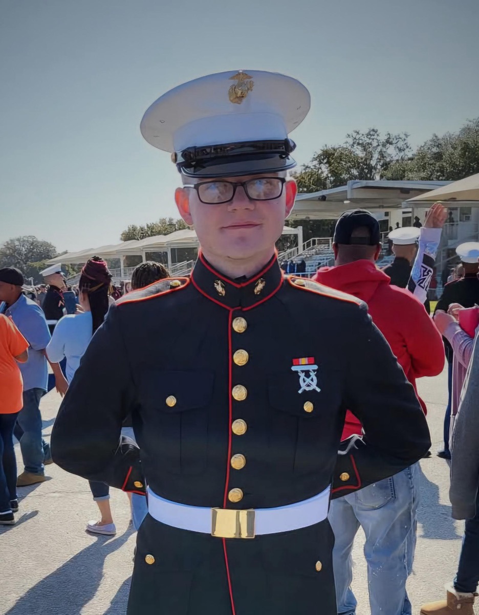 Drew Mobley posing for a photo in his Marine uniform.
