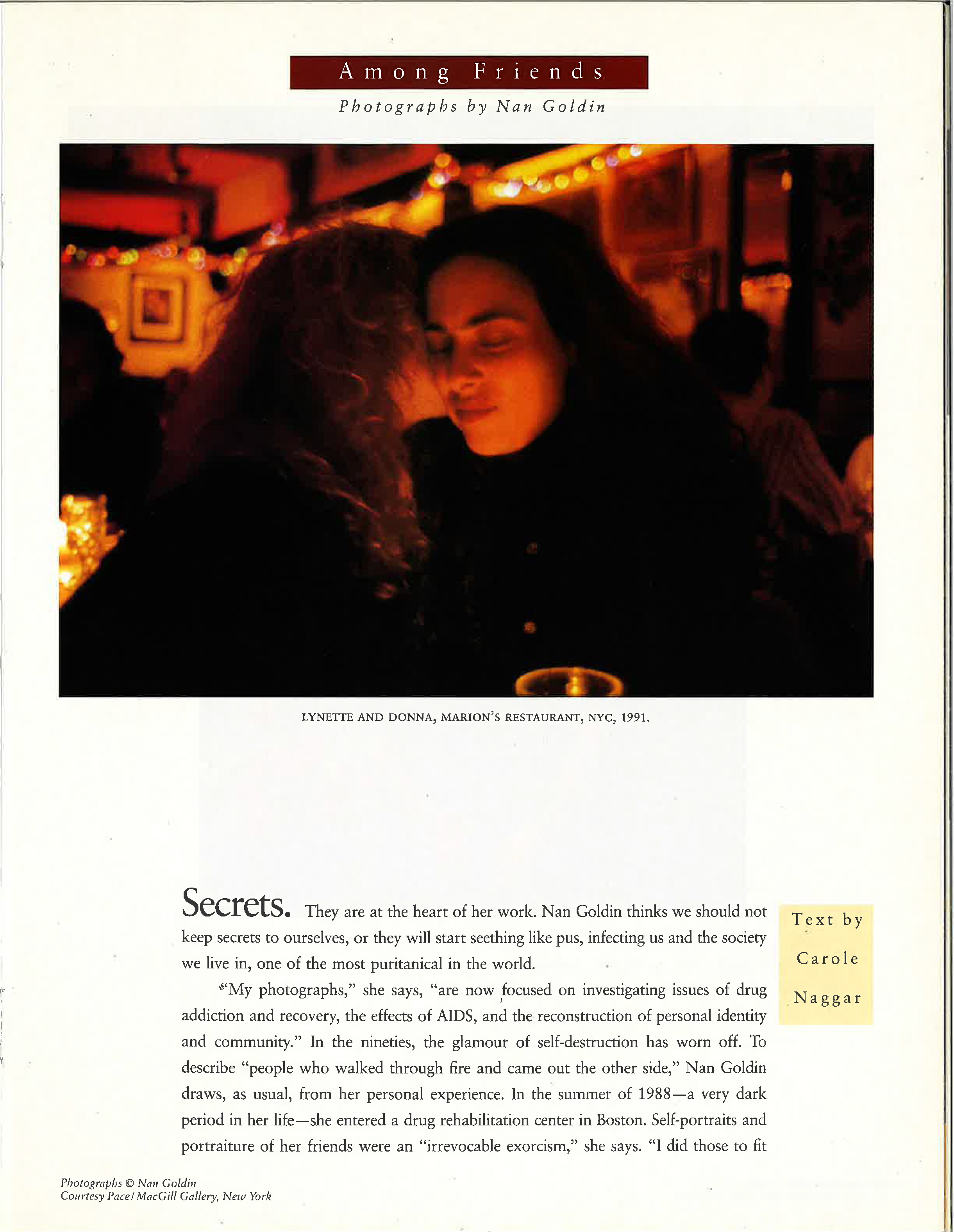 A Mother Jones magazine spread with the headline "Among Friends," with a photo by Nan Goldin. In the photo, a woman kisses another woman, who has her eyes closed.