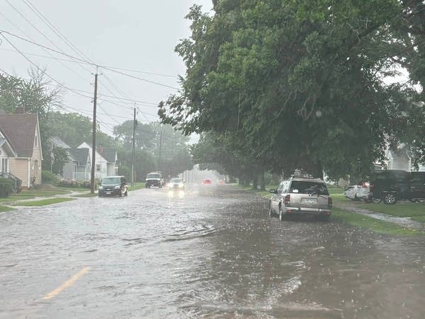 Torrential rain causes street flooding