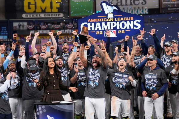 Tampa Bay Rays pitcher Freddy Peralta hold the MVP trophy after their win against the Cleveland Guardians in Game 6 of an American League Championship Series baseball game in St. Petersburg, Fla. Monday, Oct. 19, 2026.