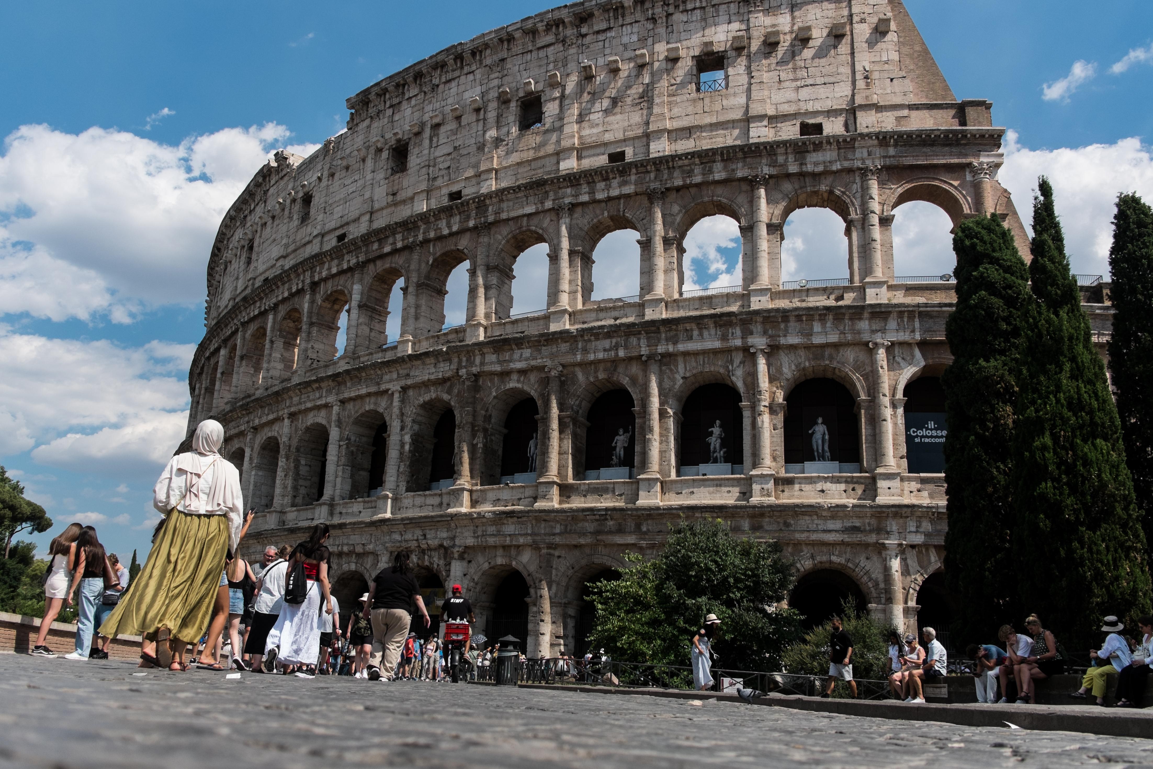 Tourists visit the Colosseum area on a summer day in Rome, Italy, on July 4, 2026. (Photo by Andrea Ronchini/NurPhoto via Getty Images)