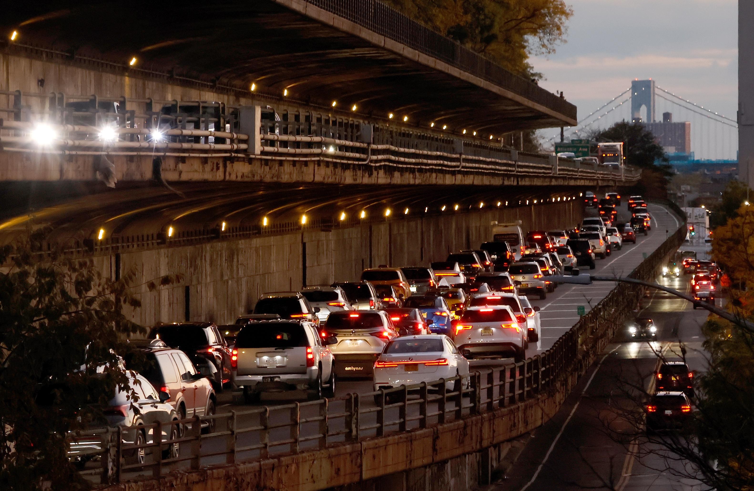 Bumper-to-bumper traffic along the Brooklyn Queens Expressway below the Brooklyn Promenade