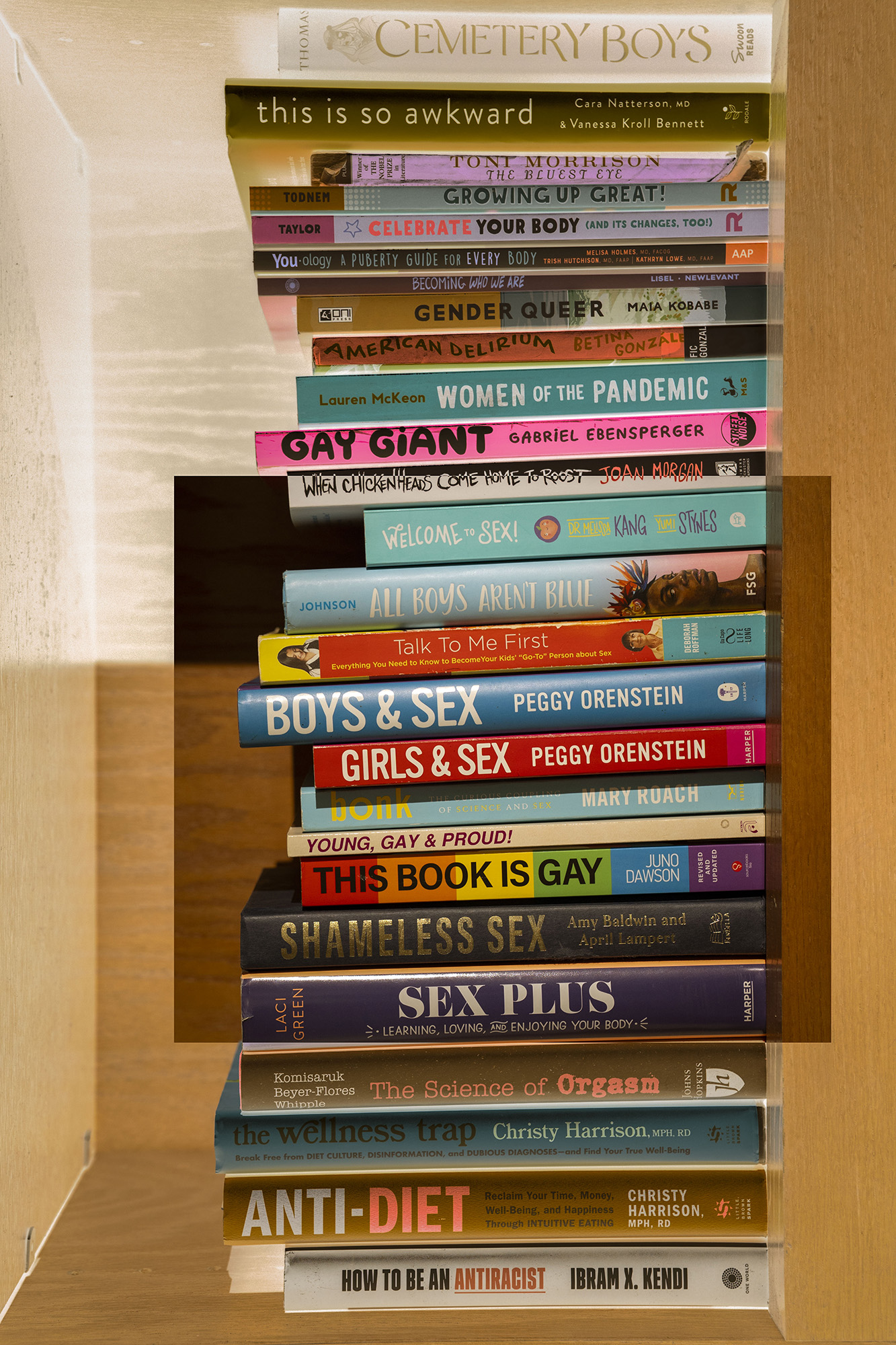 Large stake of books on their side.